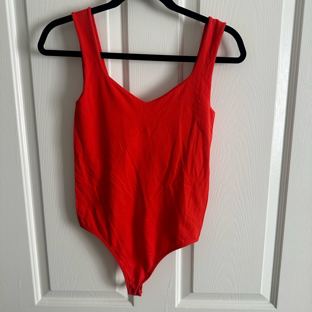 Free People orange Bodysuit One Piece